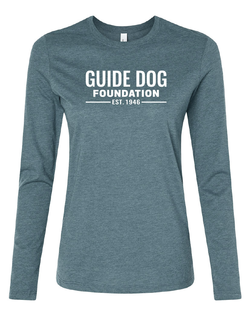 Image of ladies, long sleeve t-shirt in Heather Deep Teal with a white Guide Dog Foundation logo on the front chest with "EST. 1946" underneath.
