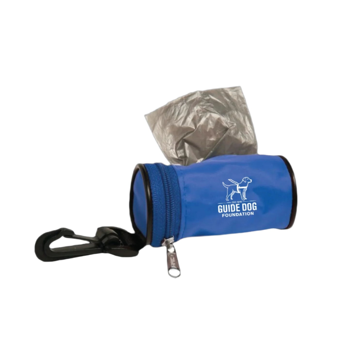 This image features a blue, cylindrical poop bag holder with a black trim and a carabiner clip for easy attachment to leashes or bags. The holder is zippered and open, showing a roll of gray plastic bags partially pulled out for convenient use. The **Guide Dog Foundation** logo is prominently displayed on the side in white, featuring a guide dog icon and text that reads "EST. 1946 Guide Dog Foundation." The design is practical and compact, ideal for carrying waste bags while walking a dog.