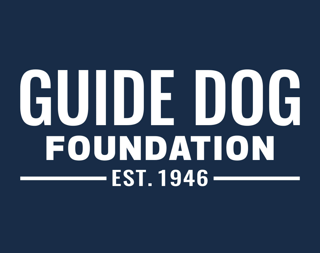 Close up of the white Guide Dog Foundation logo on a navy background.