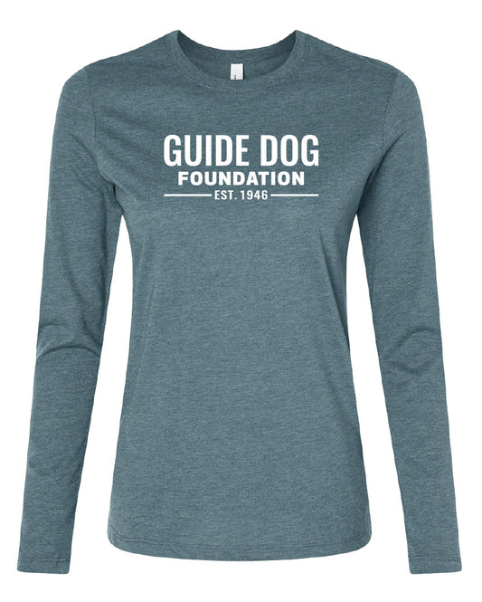 Image of ladies, long sleeve t-shirt in Heather Deep Teal with a white Guide Dog Foundation logo on the front chest with "EST. 1946" underneath.