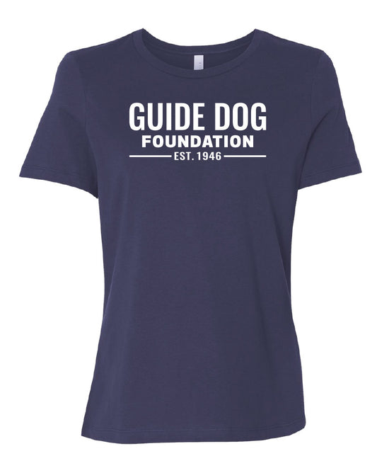 Image of a navy blue, crewneck T-Shirt with the white "Guide Dog Foundation" logo on the front with "EST. 1946" underneath
